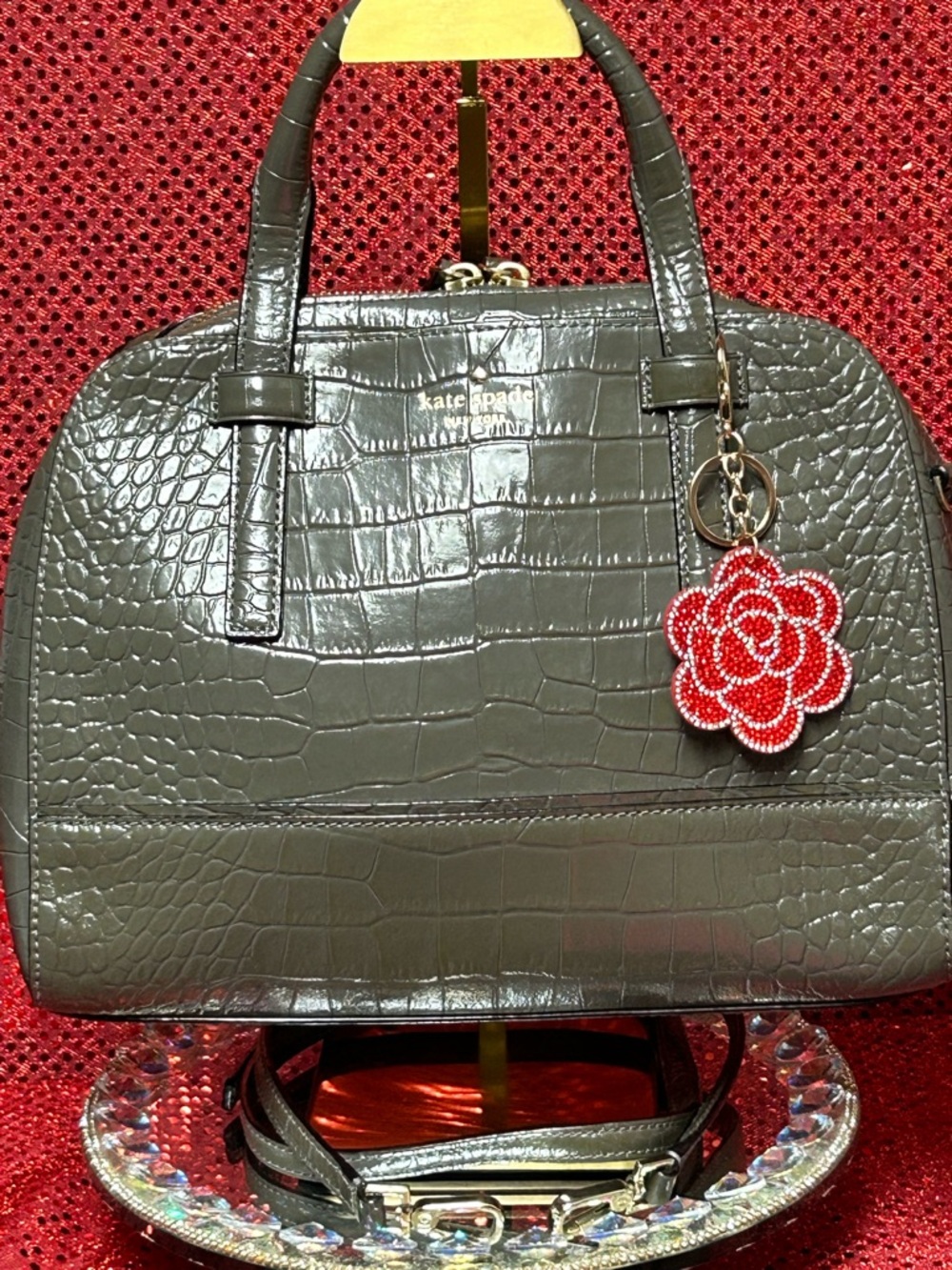 kate spade gray croc-embossed satchel with red flower charm Approx. 12 x 10 x 3